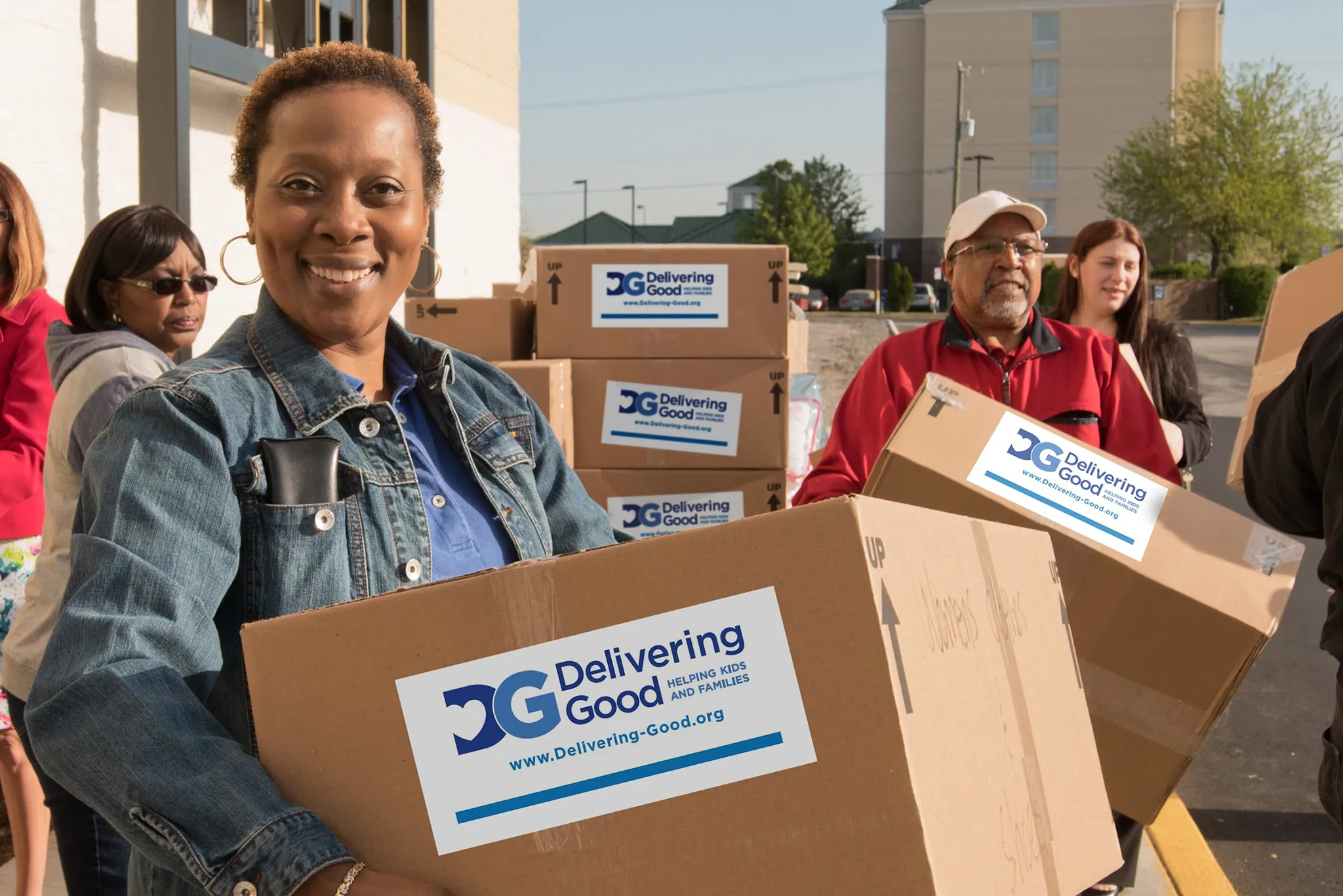 Volunteers delivering donations to help children and families