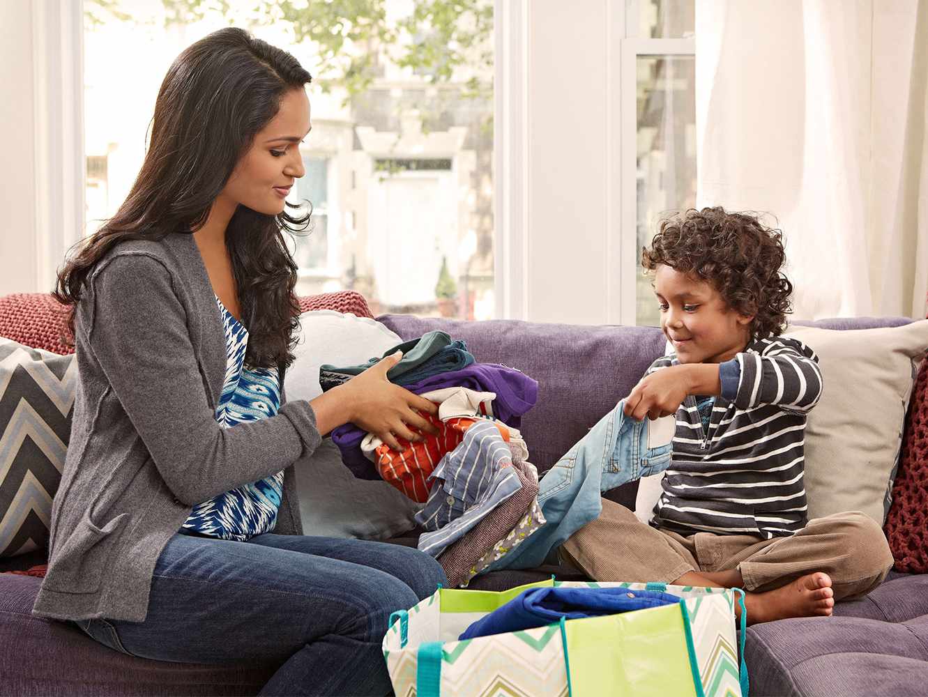Mother and son organizing donations